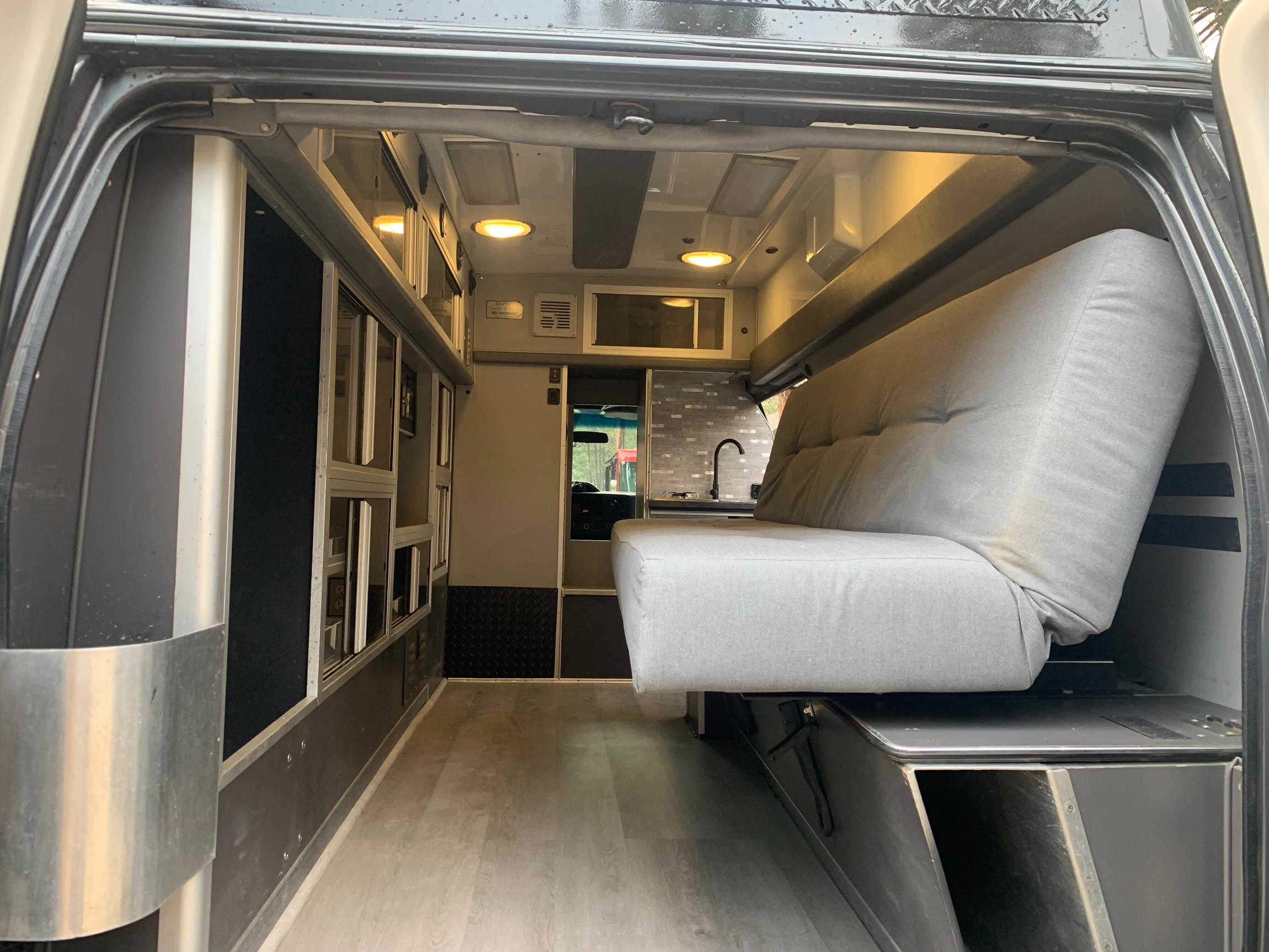 Sold: Custom 2009 Ford E-350 4×4 Camper Conversion