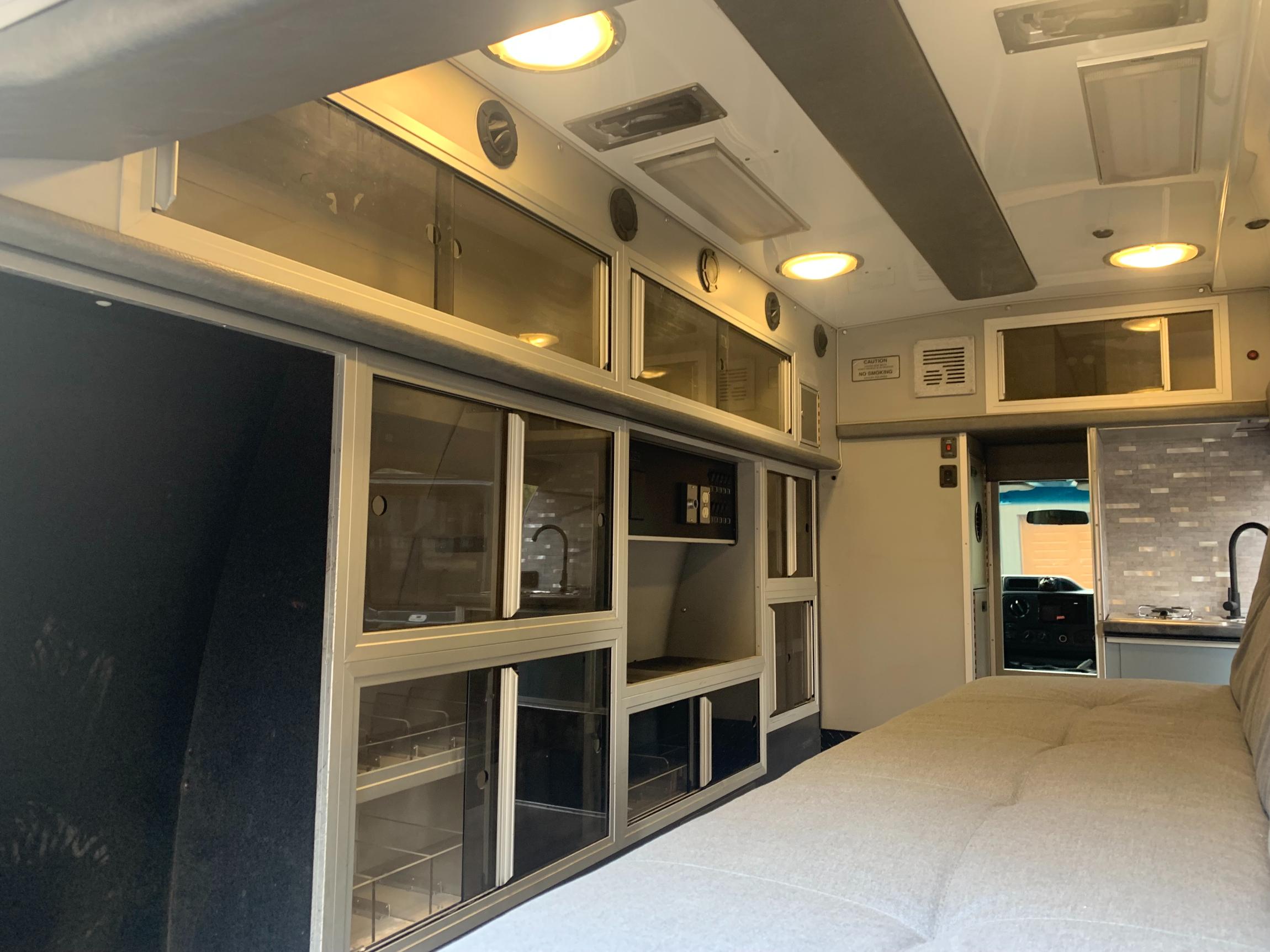 Sold: Custom 2009 Ford E-350 4×4 Camper Conversion