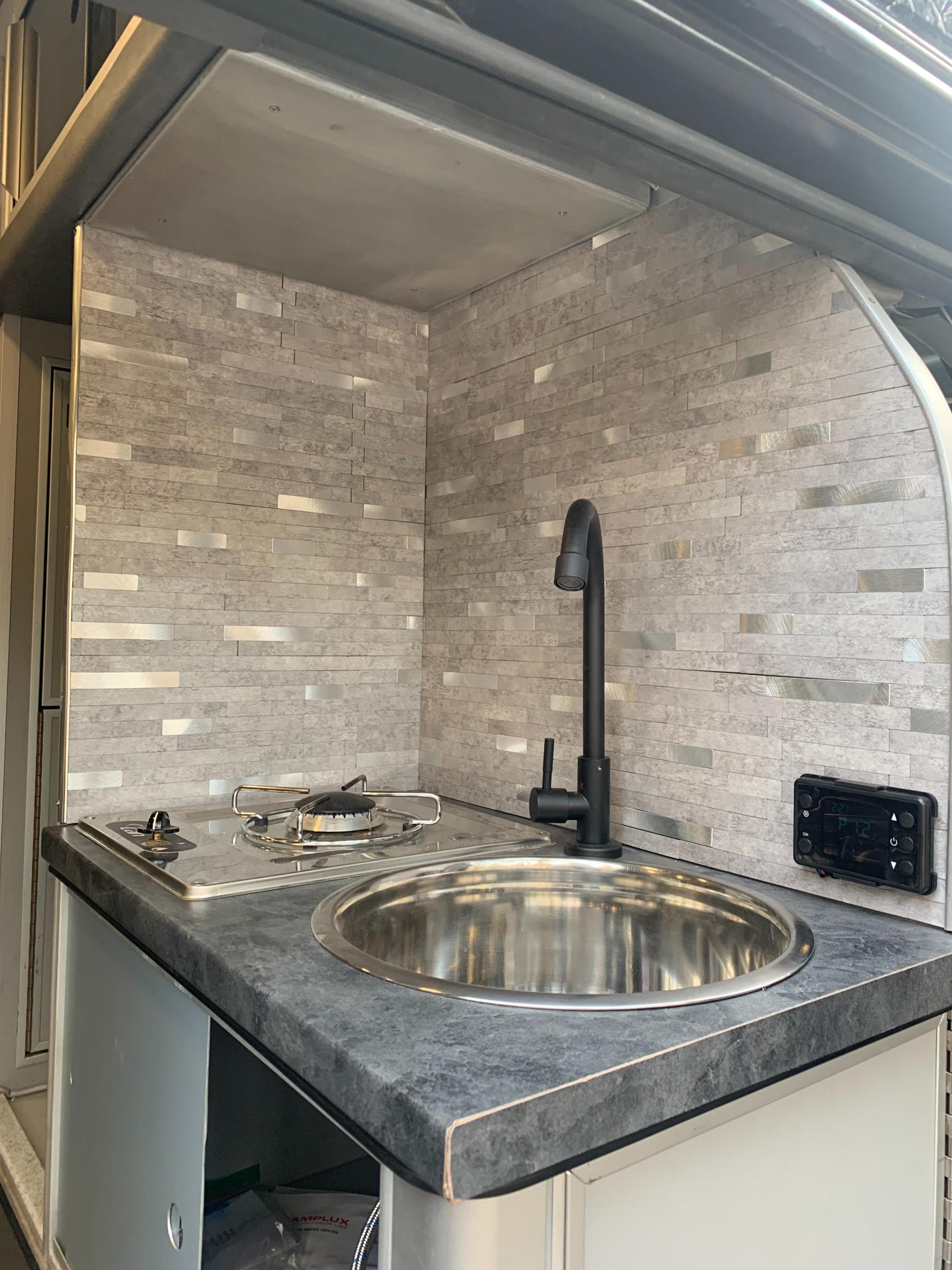 Sold: Custom 2009 Ford E-350 4×4 Camper Conversion