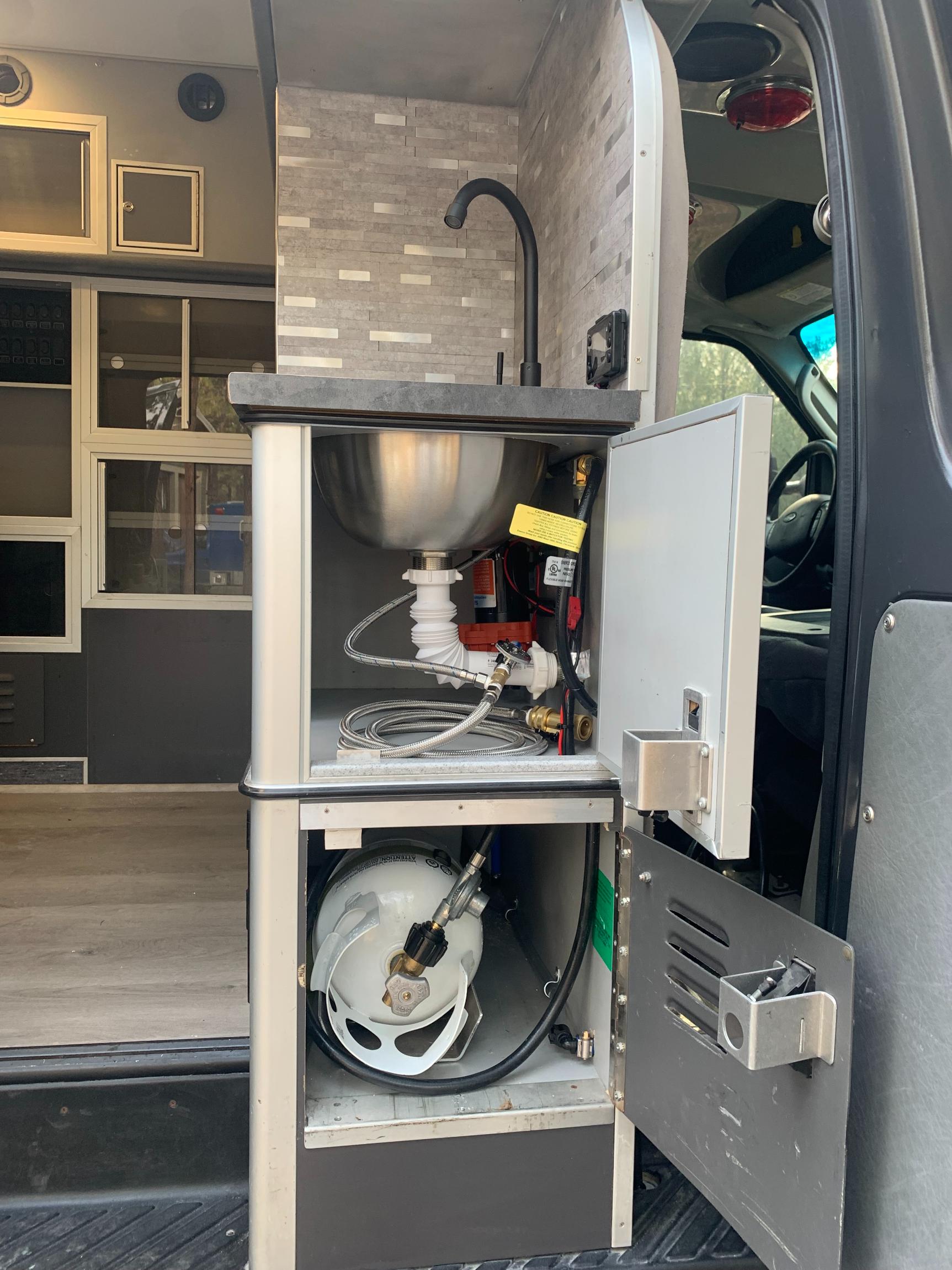 Sold: Custom 2009 Ford E-350 4×4 Camper Conversion