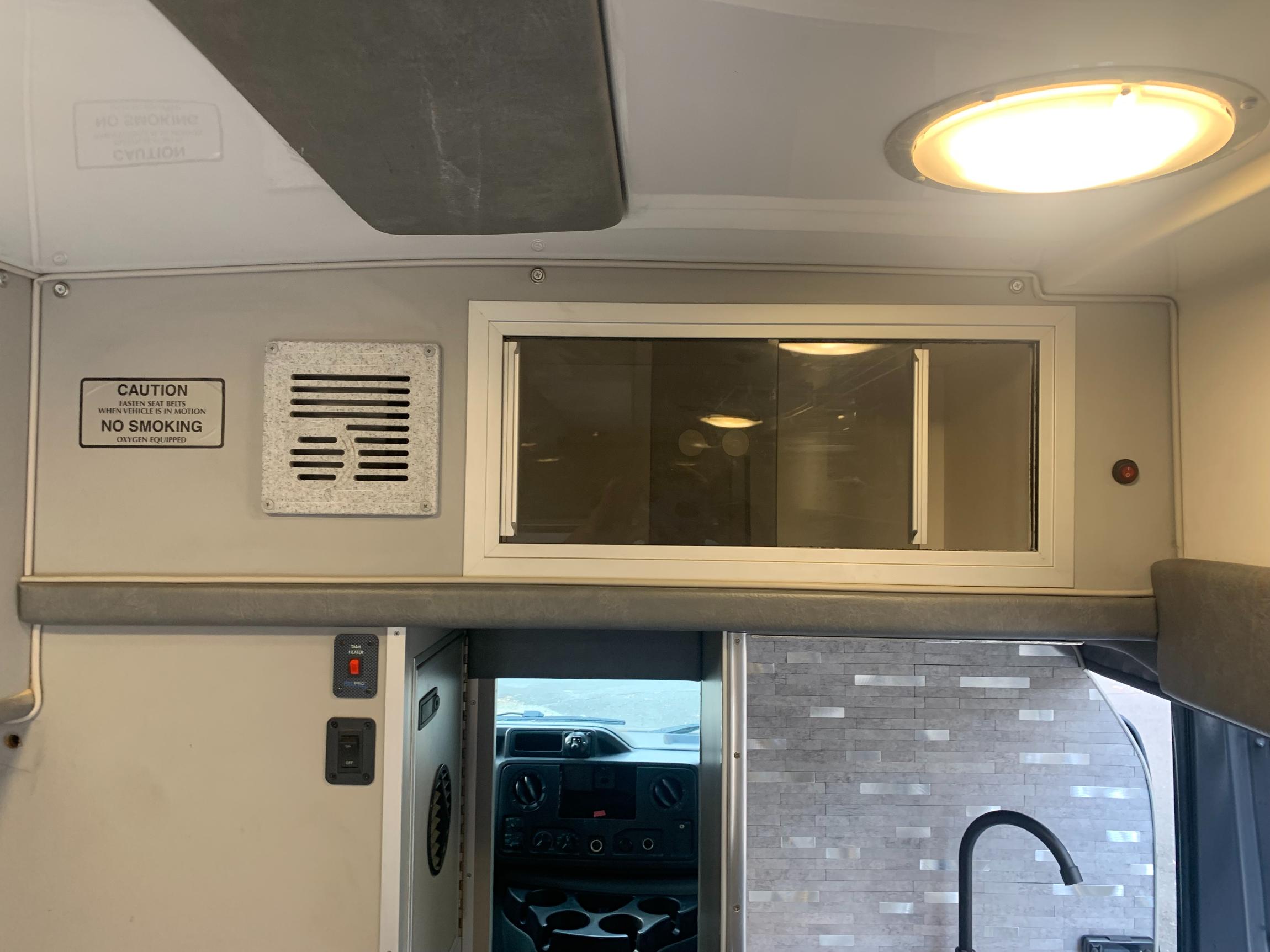 Sold: Custom 2009 Ford E-350 4×4 Camper Conversion