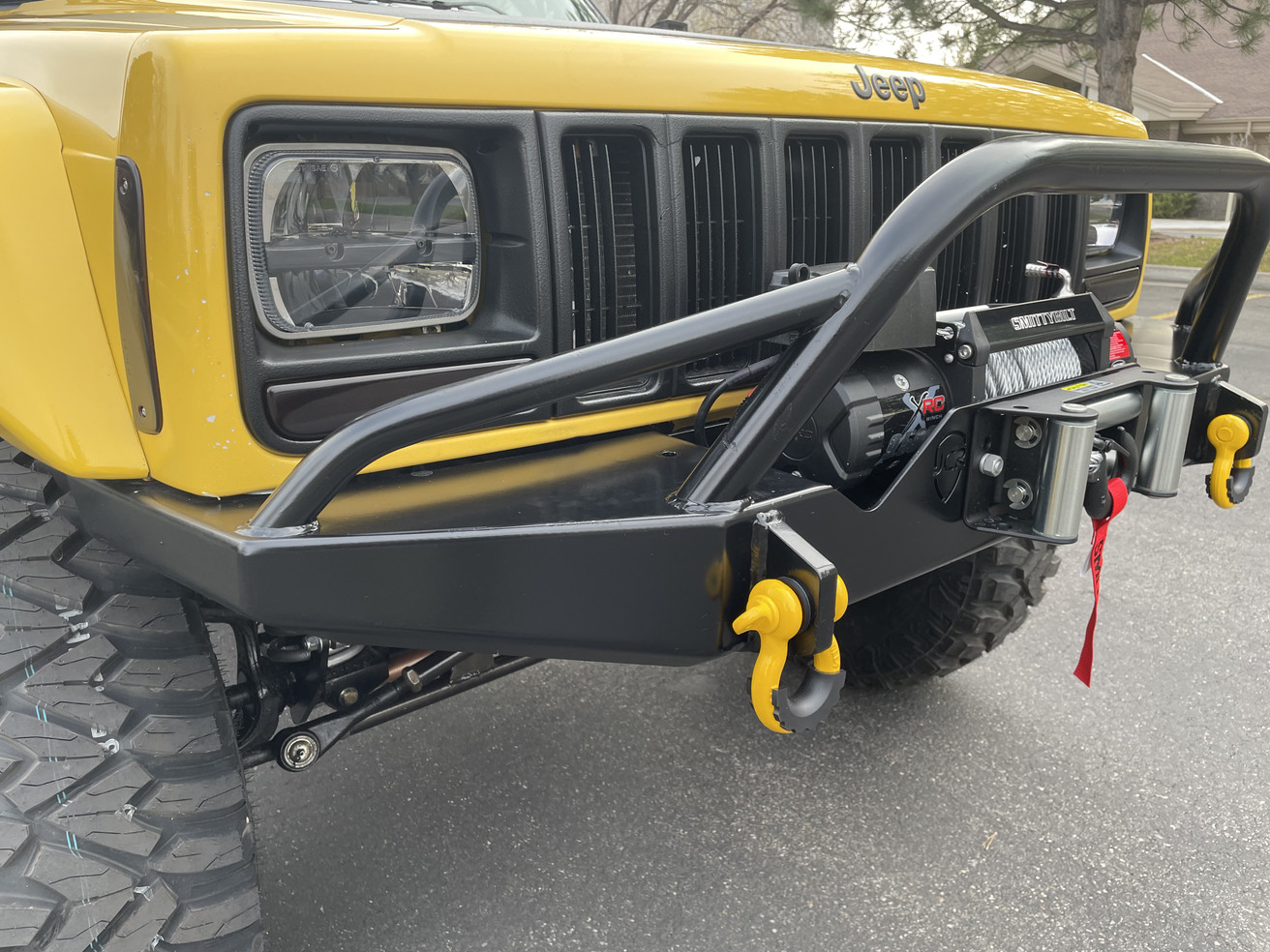 Sold: Heavily-Modified Solar Yellow 2000 Jeep Cherokee XJ