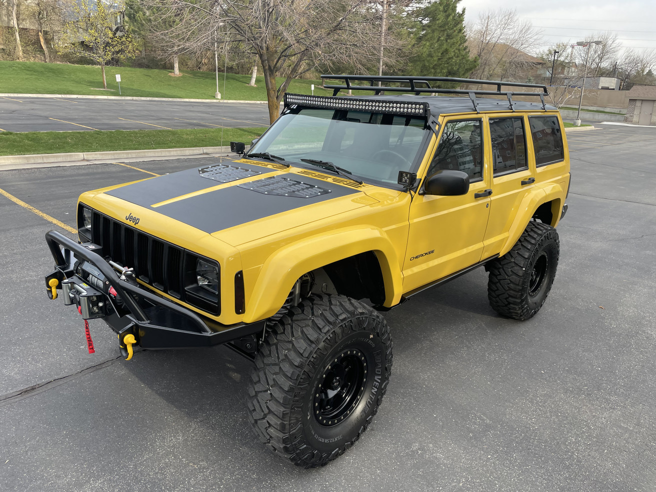 Sold: Heavily-Modified Solar Yellow 2000 Jeep Cherokee XJ