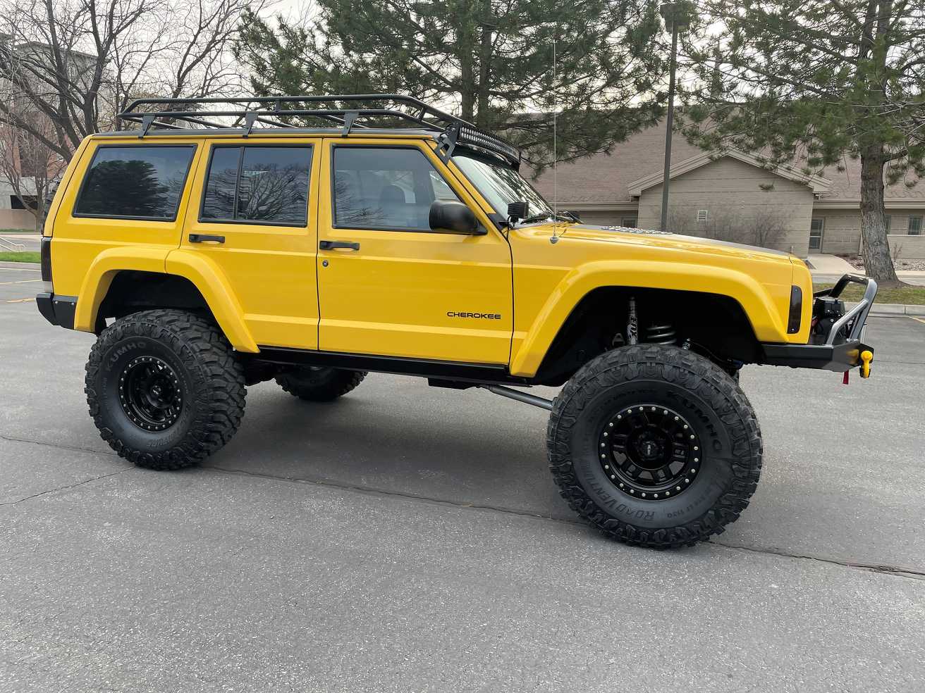Sold: Heavily-Modified Solar Yellow 2000 Jeep Cherokee XJ