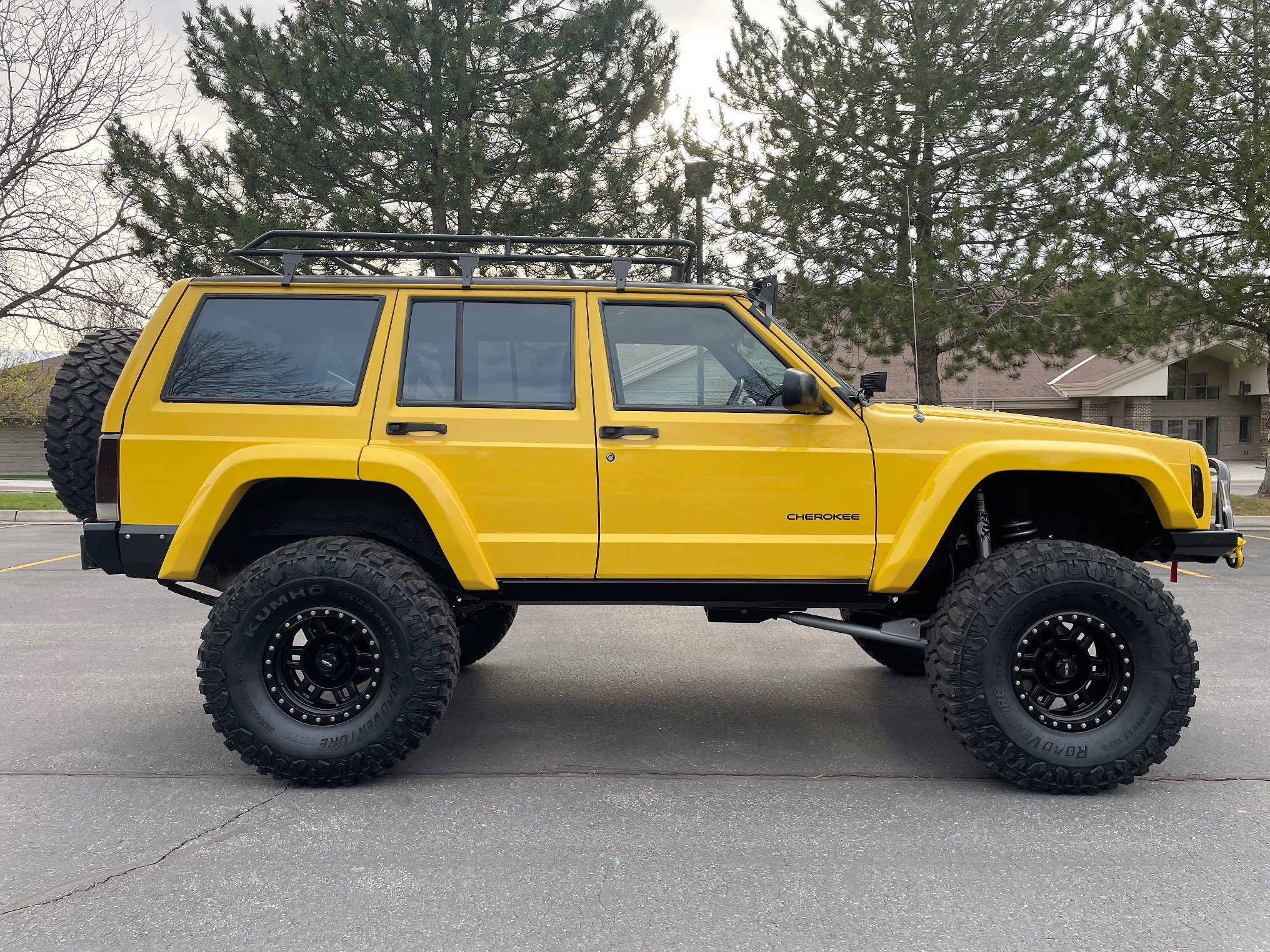 Sold: Heavily-Modified Solar Yellow 2000 Jeep Cherokee XJ