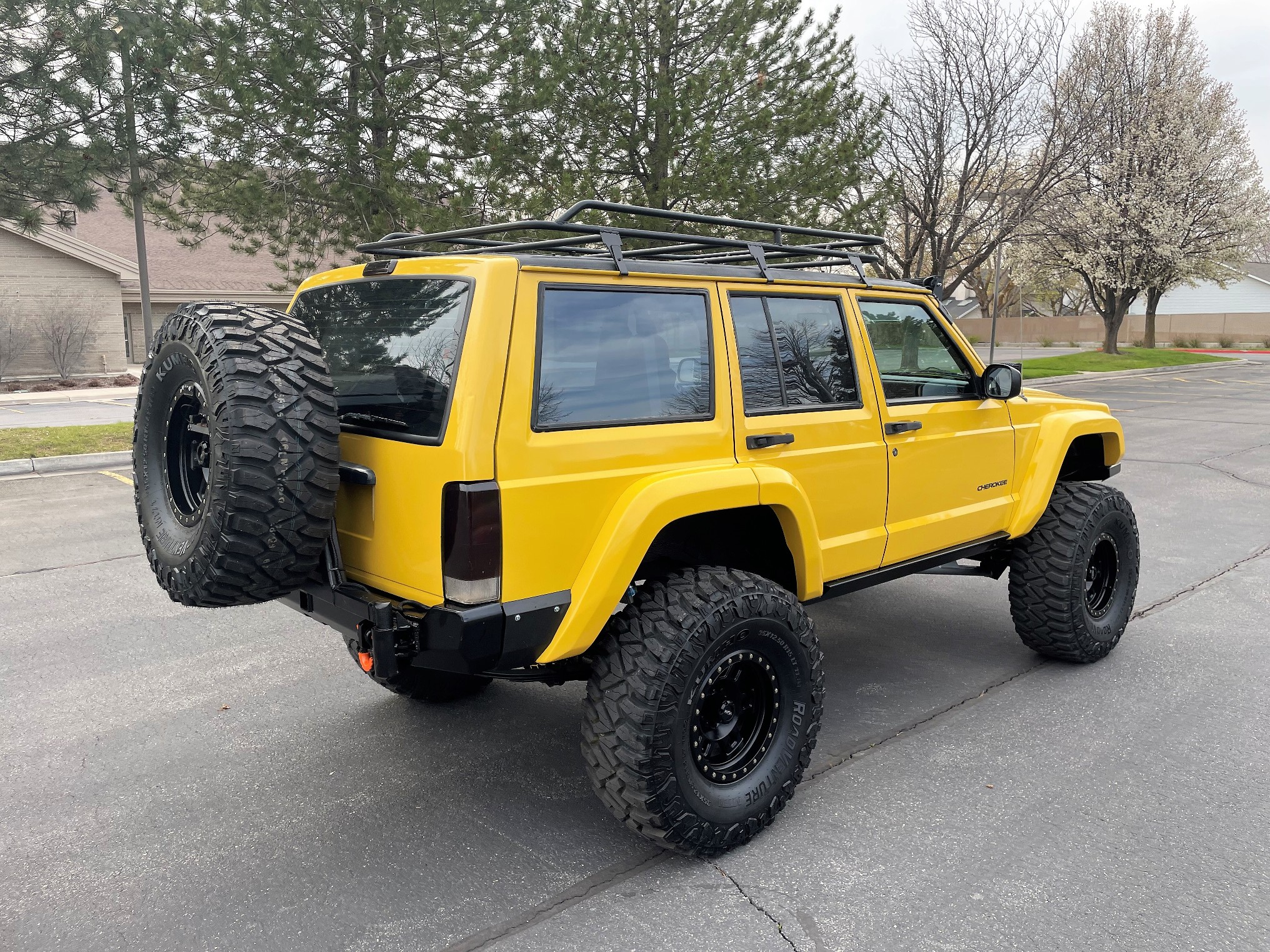 Sold: Heavily-Modified Solar Yellow 2000 Jeep Cherokee XJ