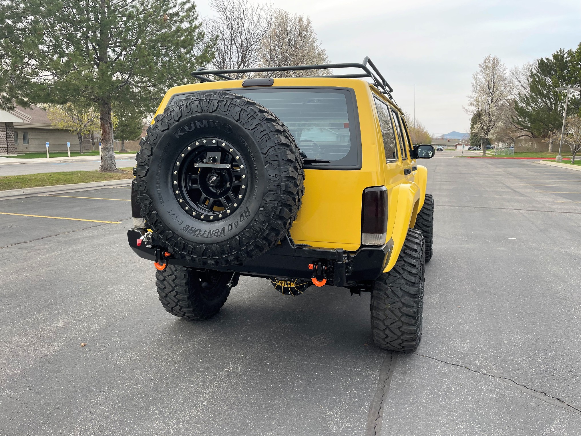 Sold: Heavily-Modified Solar Yellow 2000 Jeep Cherokee XJ