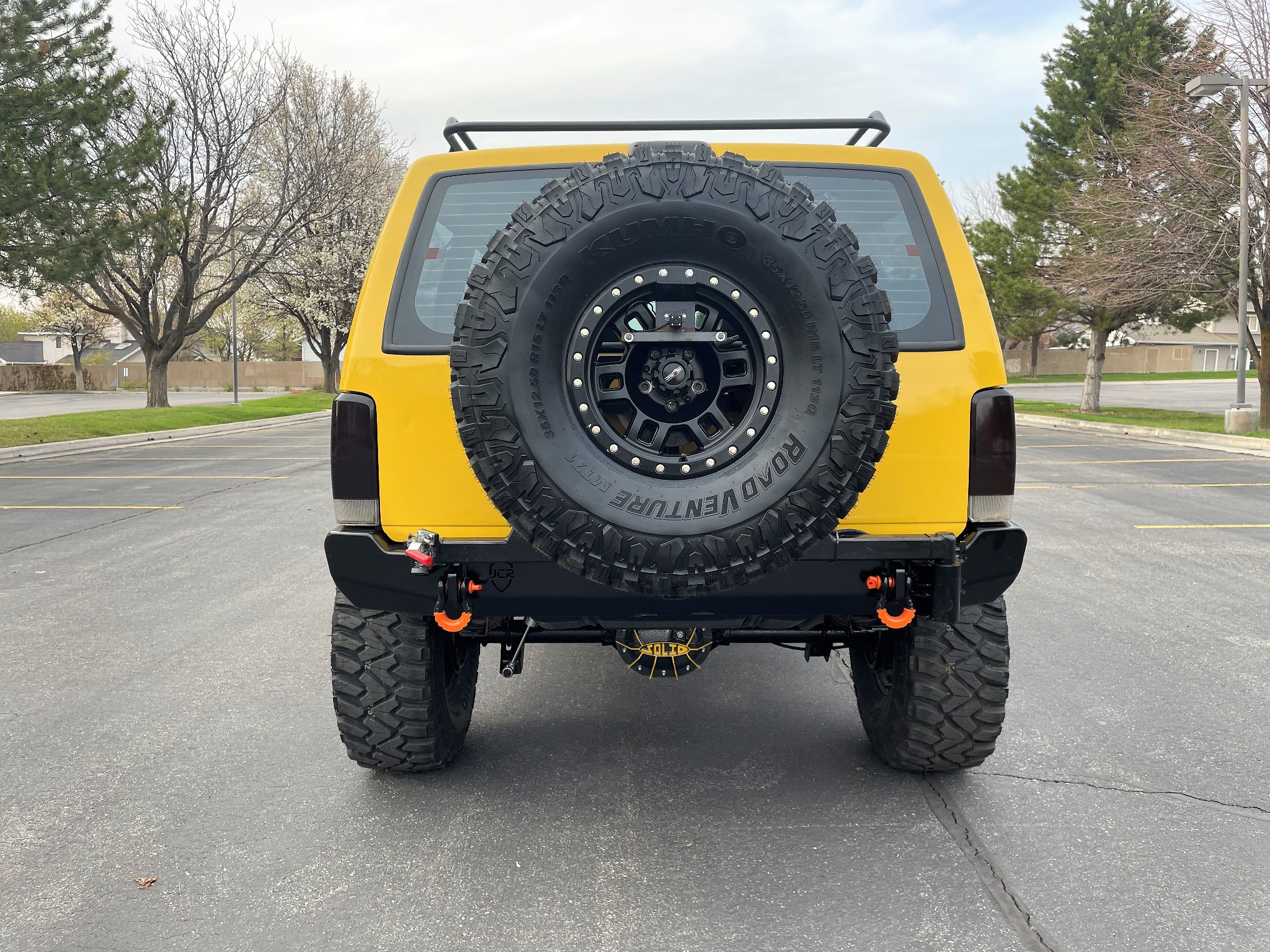 Sold: Heavily-Modified Solar Yellow 2000 Jeep Cherokee XJ