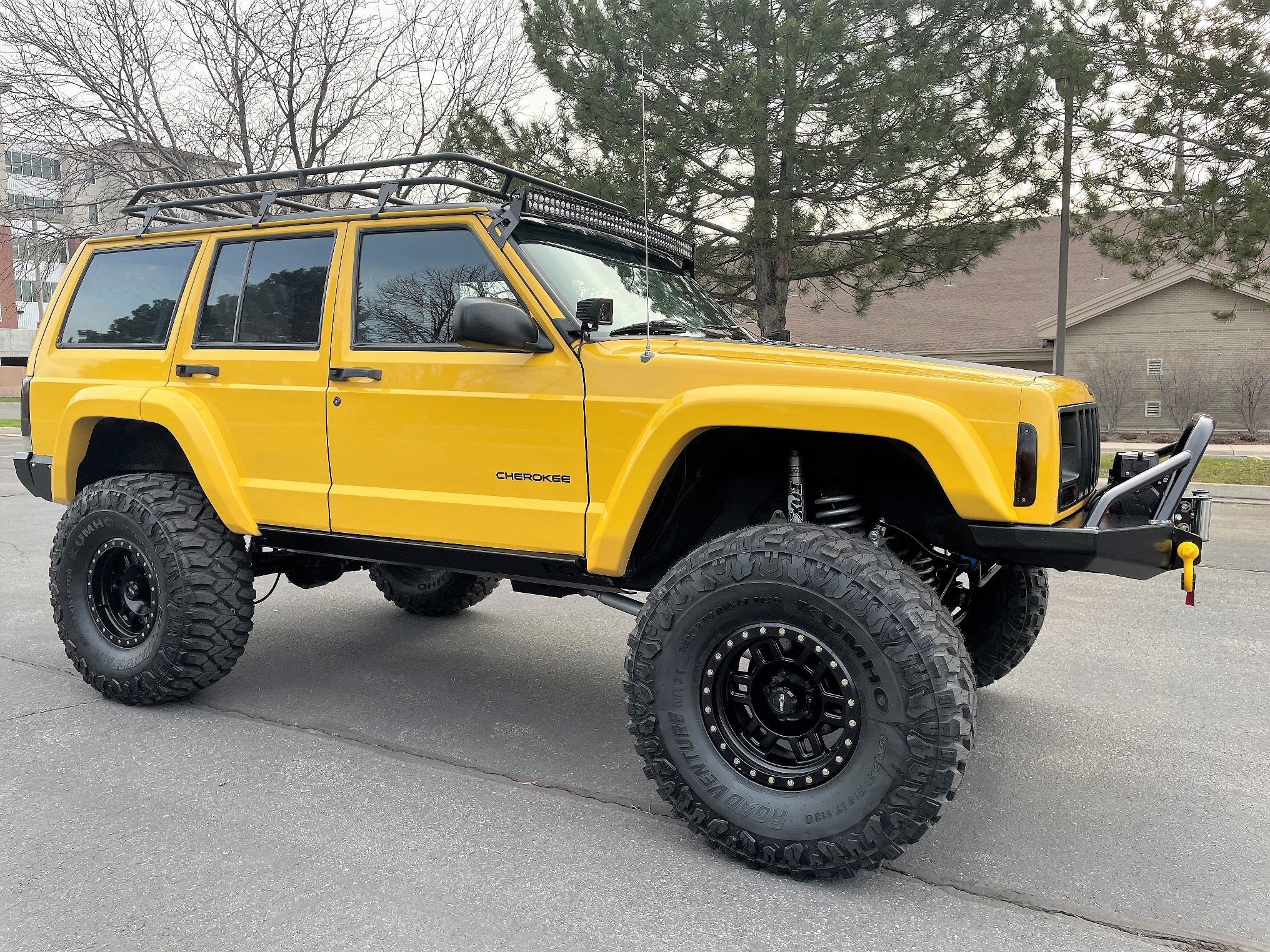Sold: Heavily-Modified Solar Yellow 2000 Jeep Cherokee XJ