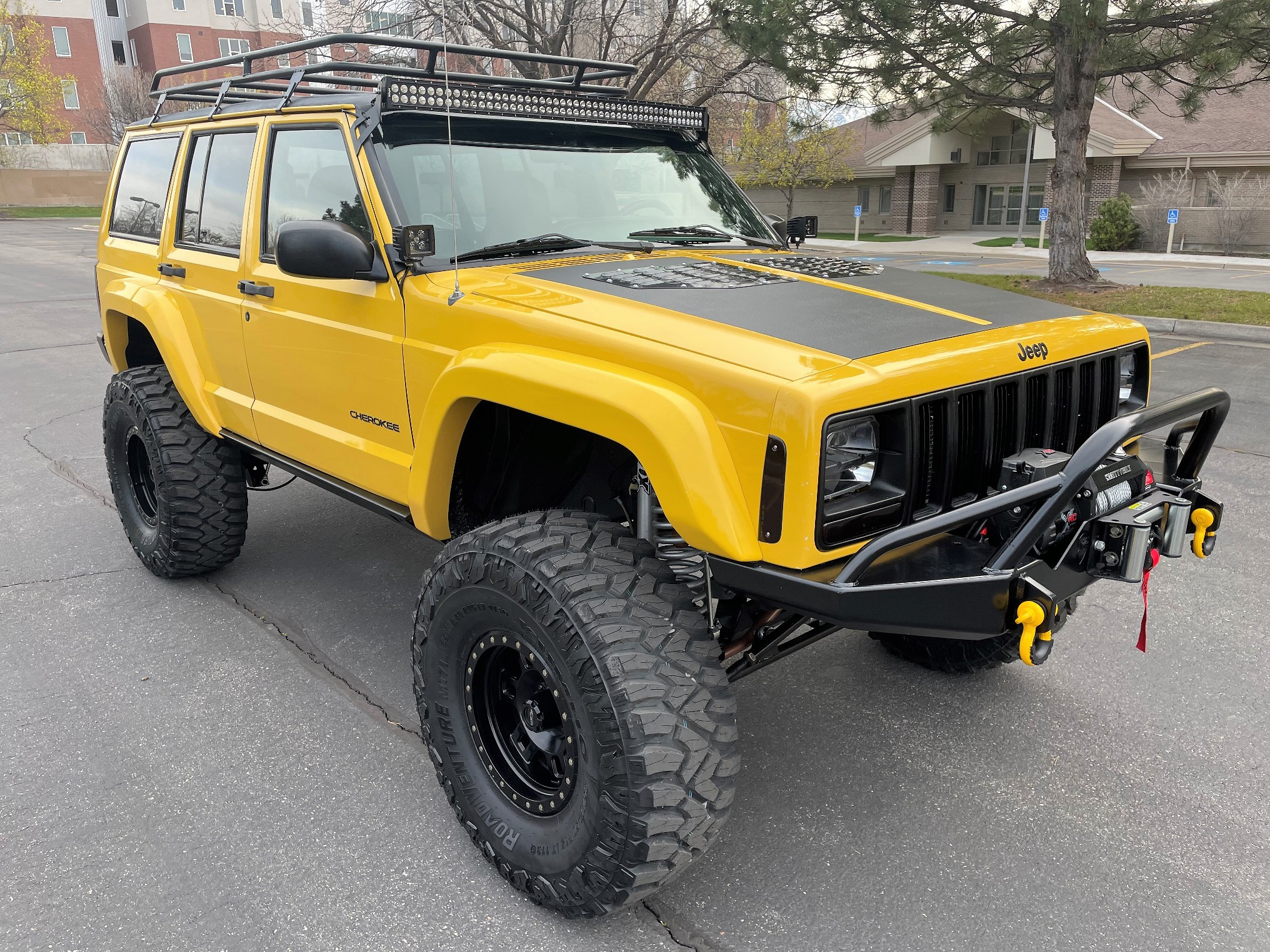 Sold: Heavily-Modified Solar Yellow 2000 Jeep Cherokee XJ