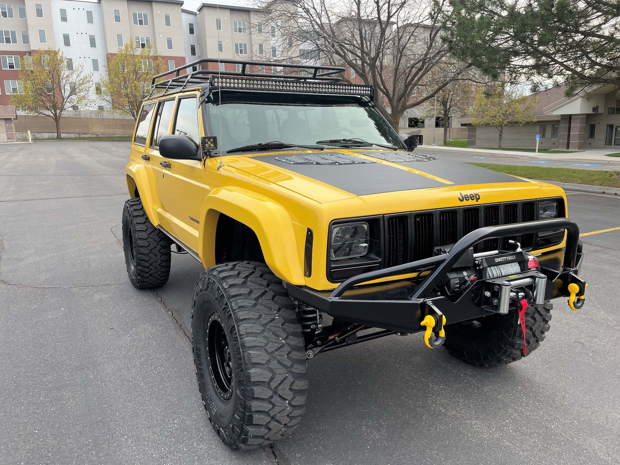 Sold: Heavily-Modified Solar Yellow 2000 Jeep Cherokee XJ