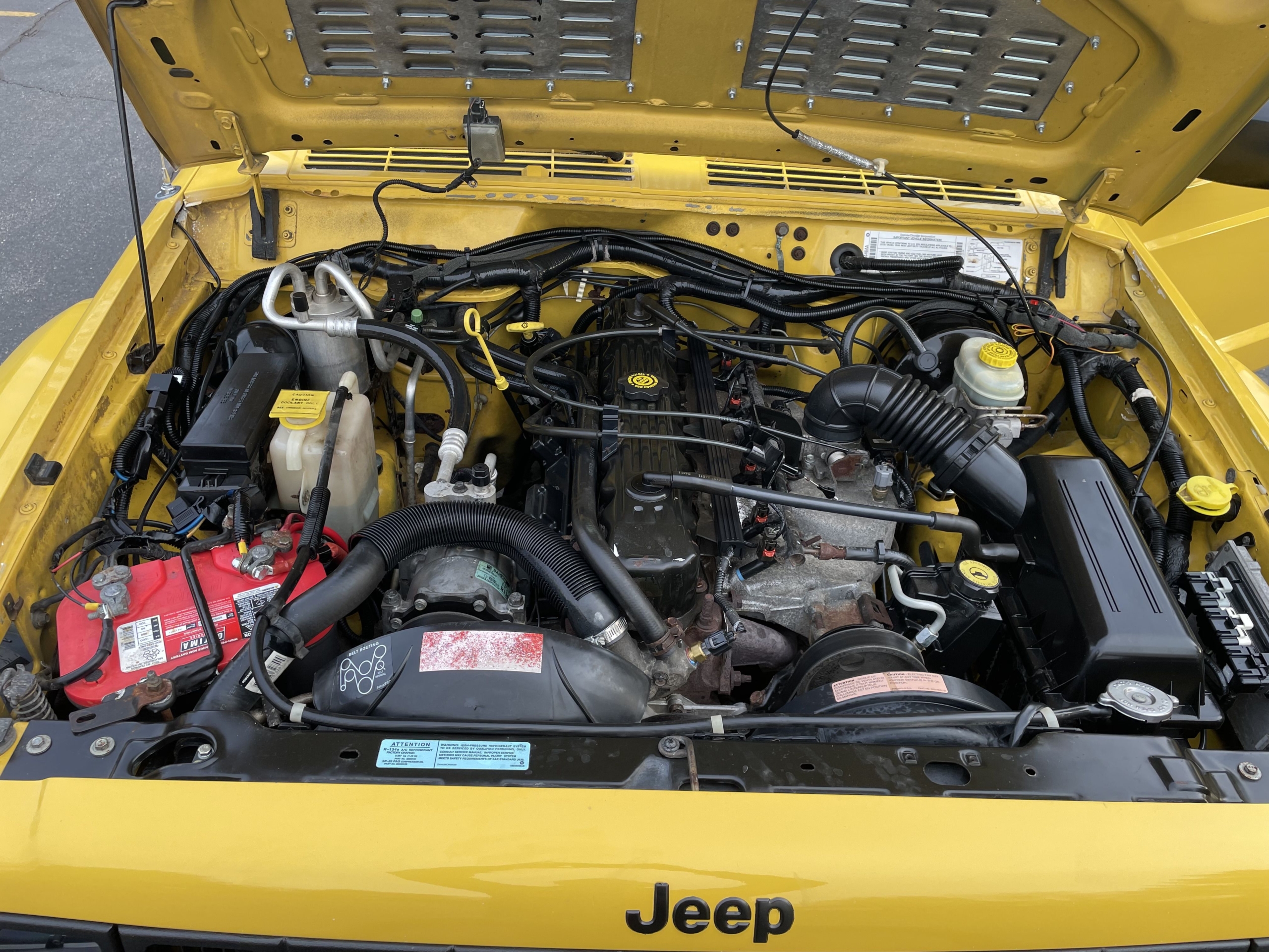 Sold: Heavily-Modified Solar Yellow 2000 Jeep Cherokee XJ