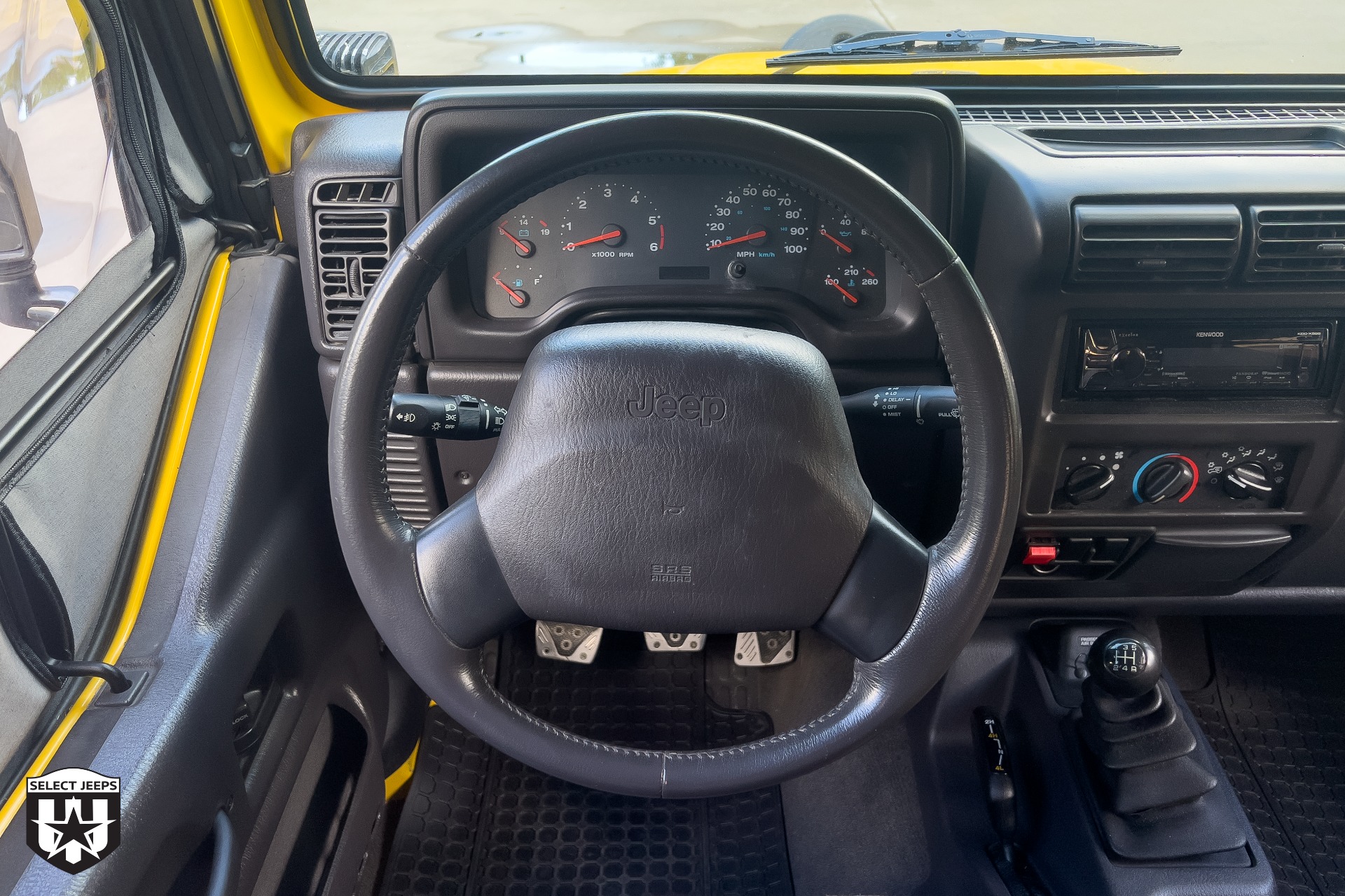 Solar Yellow 2002 Jeep Wrangler Sport