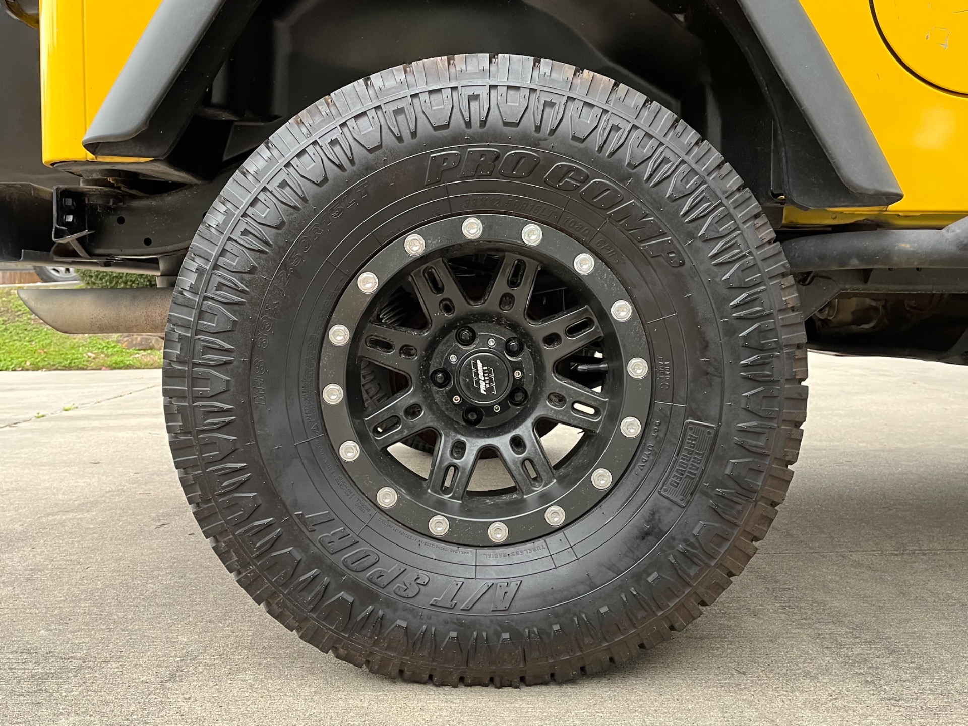Solar Yellow 2002 Jeep Wrangler Sport