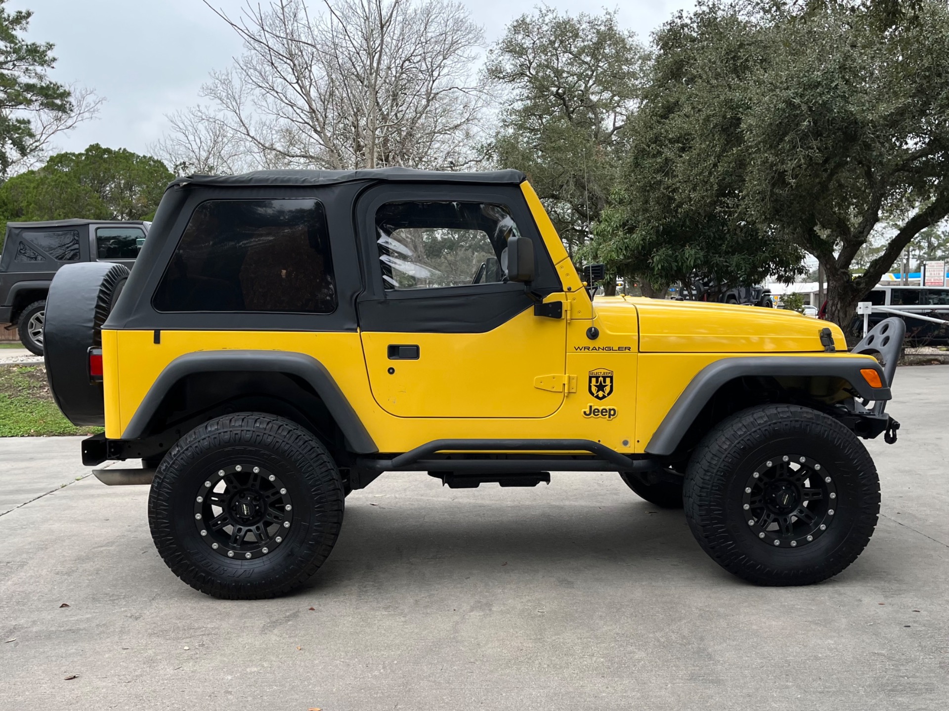 Solar Yellow 2002 Jeep Wrangler Sport
