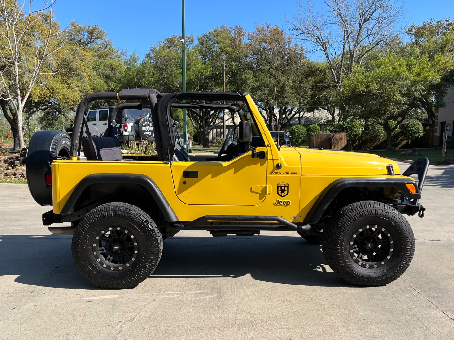 Solar Yellow 2002 Jeep Wrangler Sport - 5