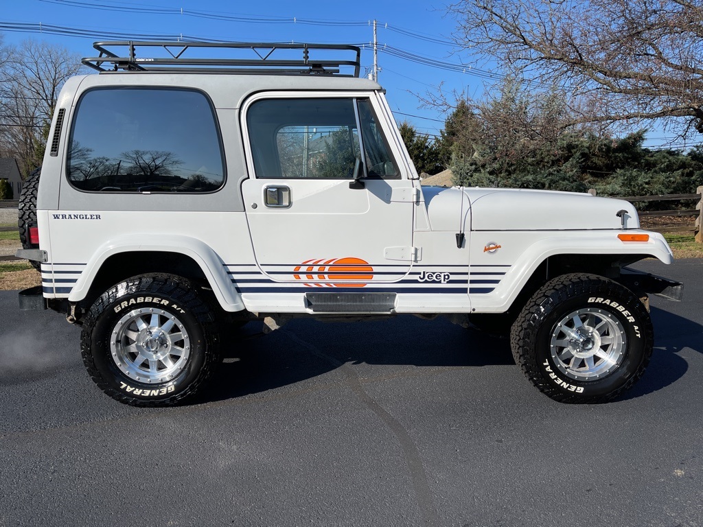 Sold: 1990 Jeep Wrangler Islander YJ