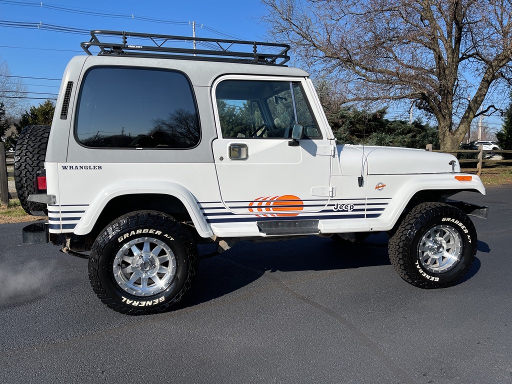 Sold: 1990 Jeep Wrangler Islander YJ