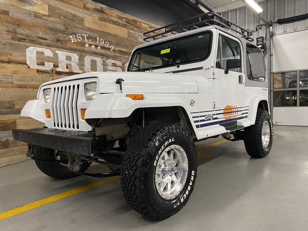 Sold: 1990 Jeep Wrangler Islander YJ