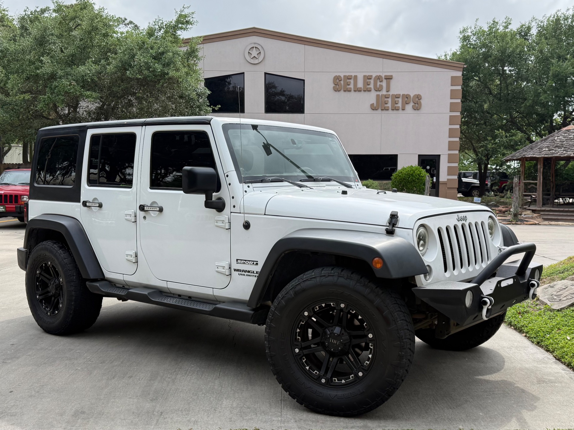 Used-2014-Jeep-Wrangler-Unlimited-Sport