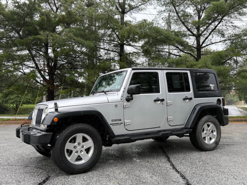 2012-jeep-wrangler-unlimited-sport-4x4-4dr-suv (0)