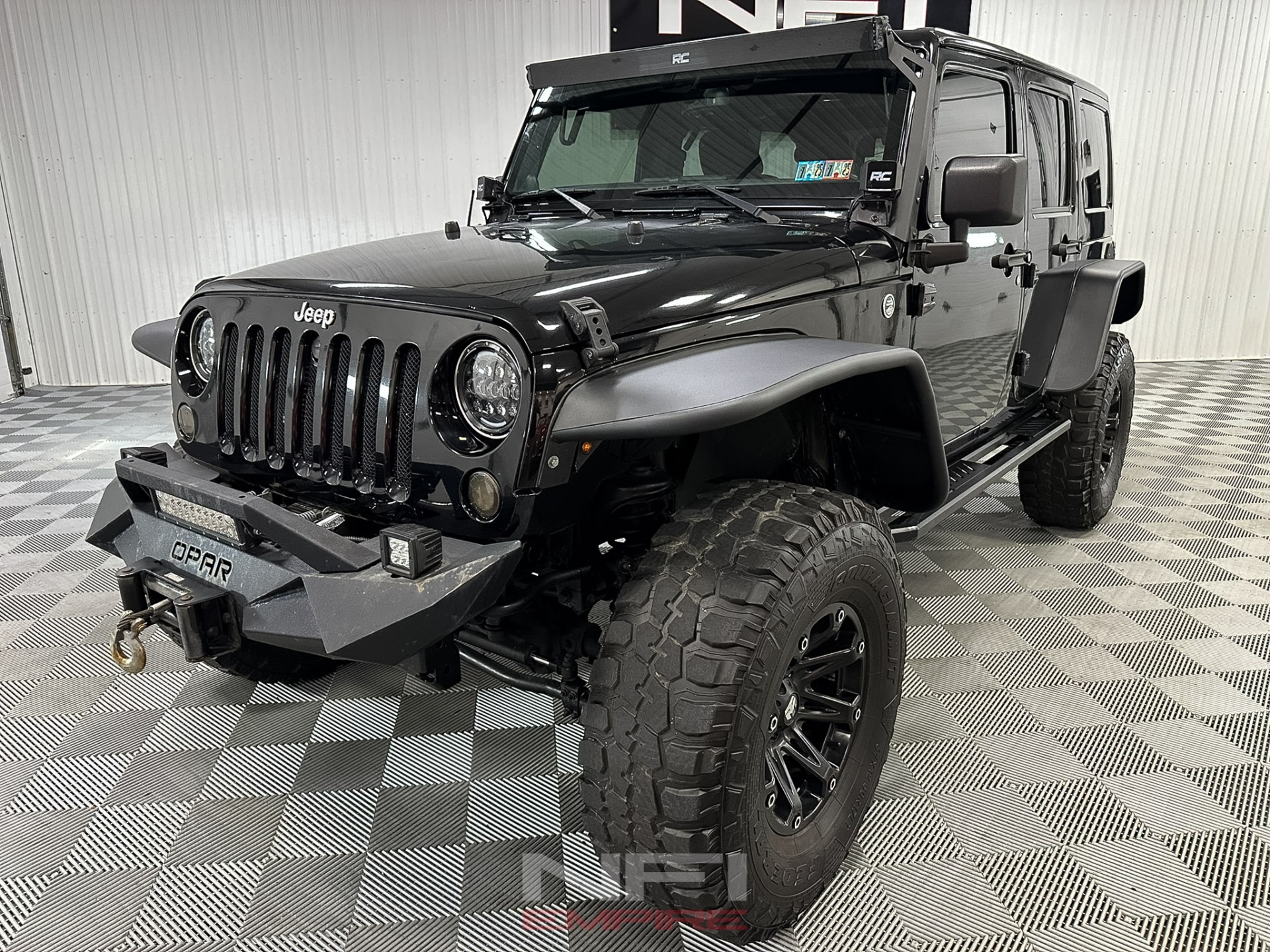 Used-2014-Jeep-Wrangler-Unlimited-Sport-SUV-4D-1750359101 (1)