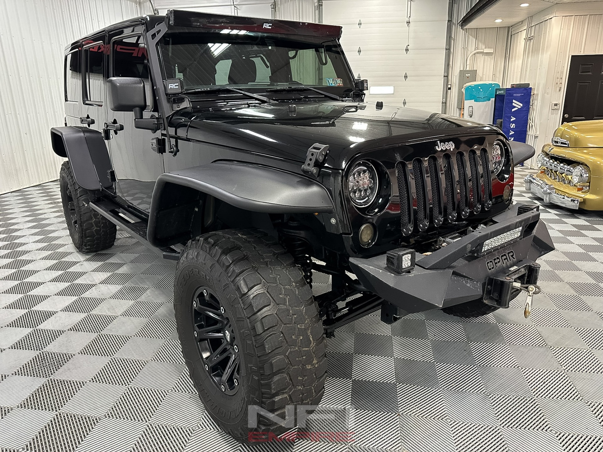 Used-2014-Jeep-Wrangler-Unlimited-Sport-SUV-4D-1750359102 (1)