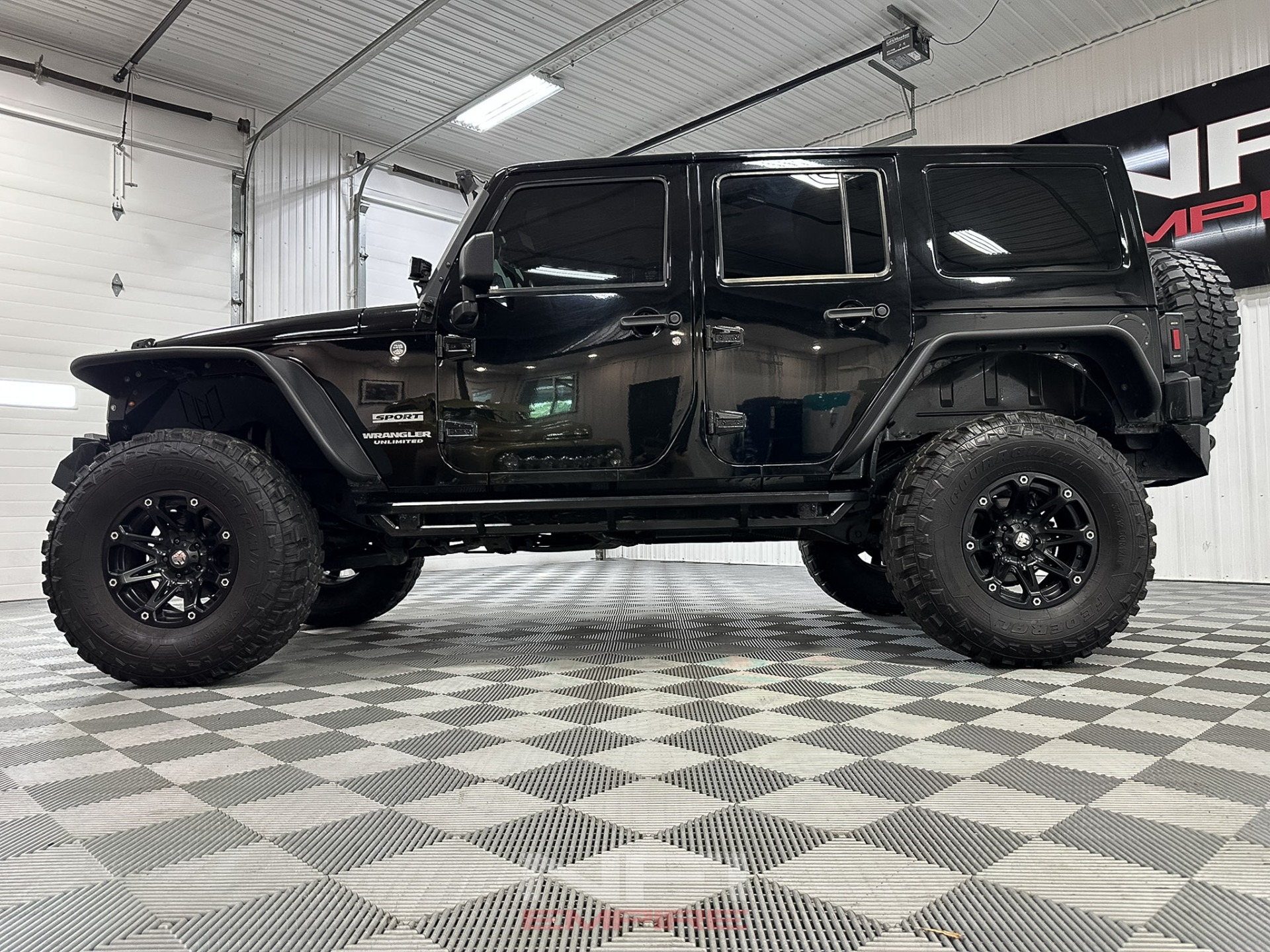 Used-2014-Jeep-Wrangler-Unlimited-Sport-SUV-4D-1750359105 (1)